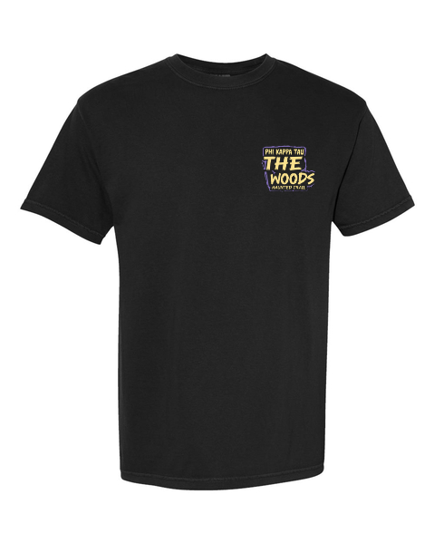 Front of the black The Woods tee: small purple and yellow Phi Kappa Tau The Woods Haunted Trail chest print.